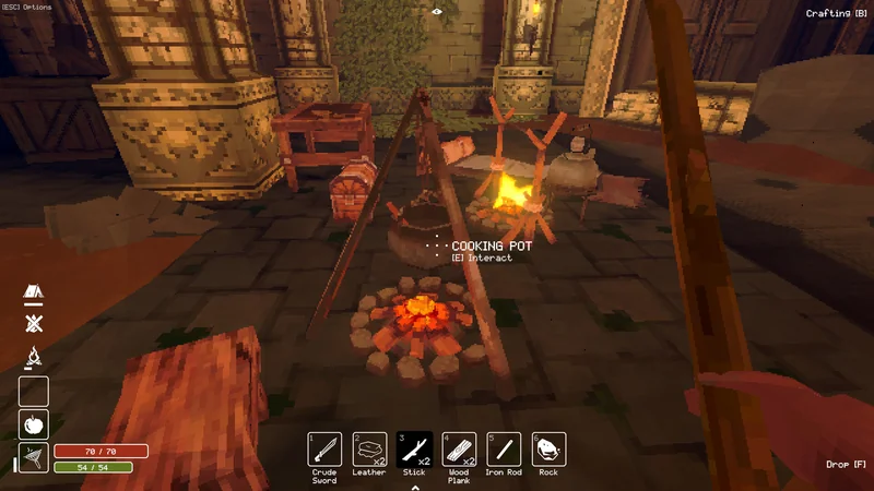 A cooking pot and glowing fire in a stone-walled camp